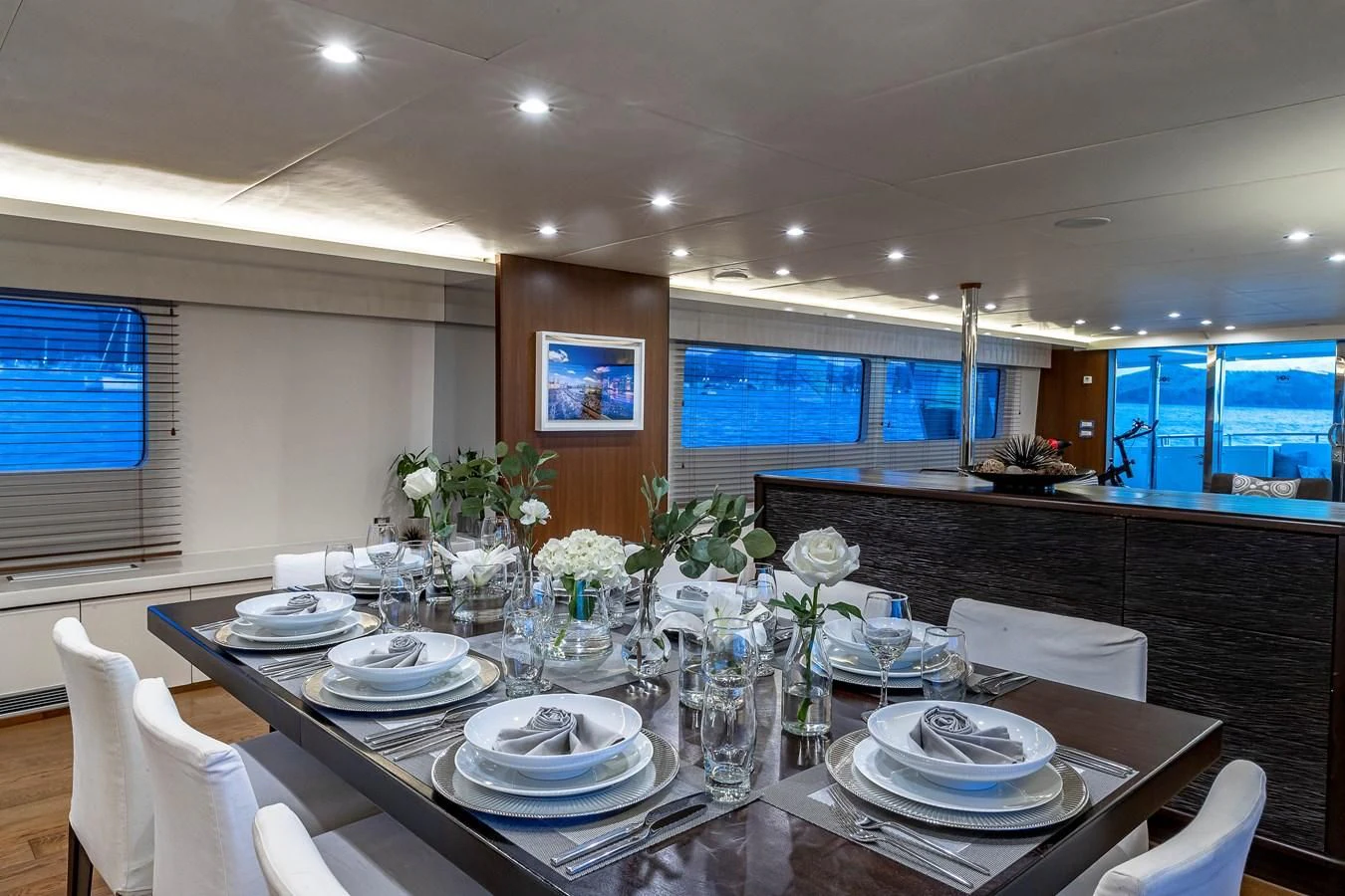 a table set for a dinner aboard KARTAL YUVASI Yacht for Charter