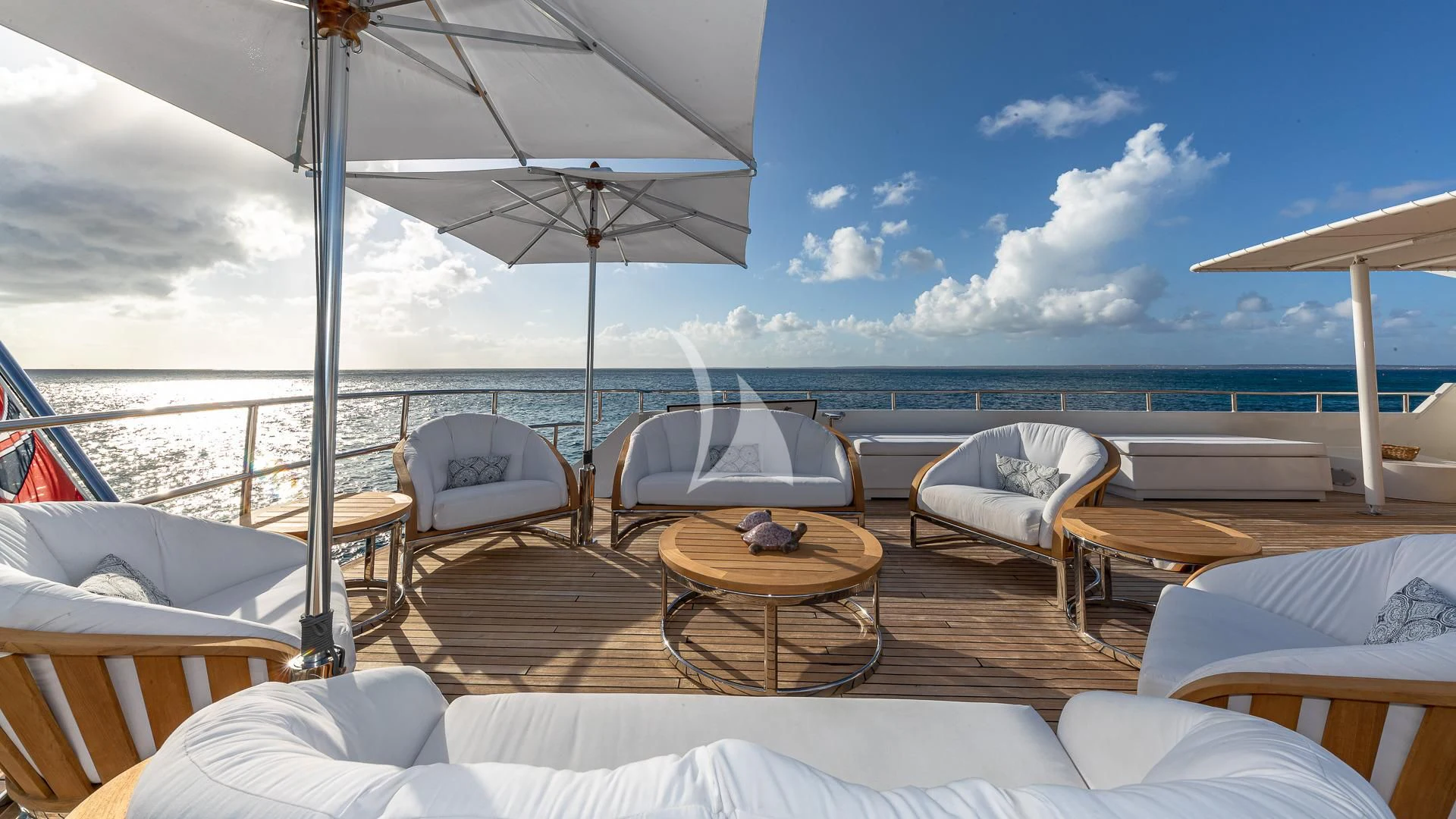 a room with a table and chairs on it aboard KARTAL YUVASI Yacht for Charter