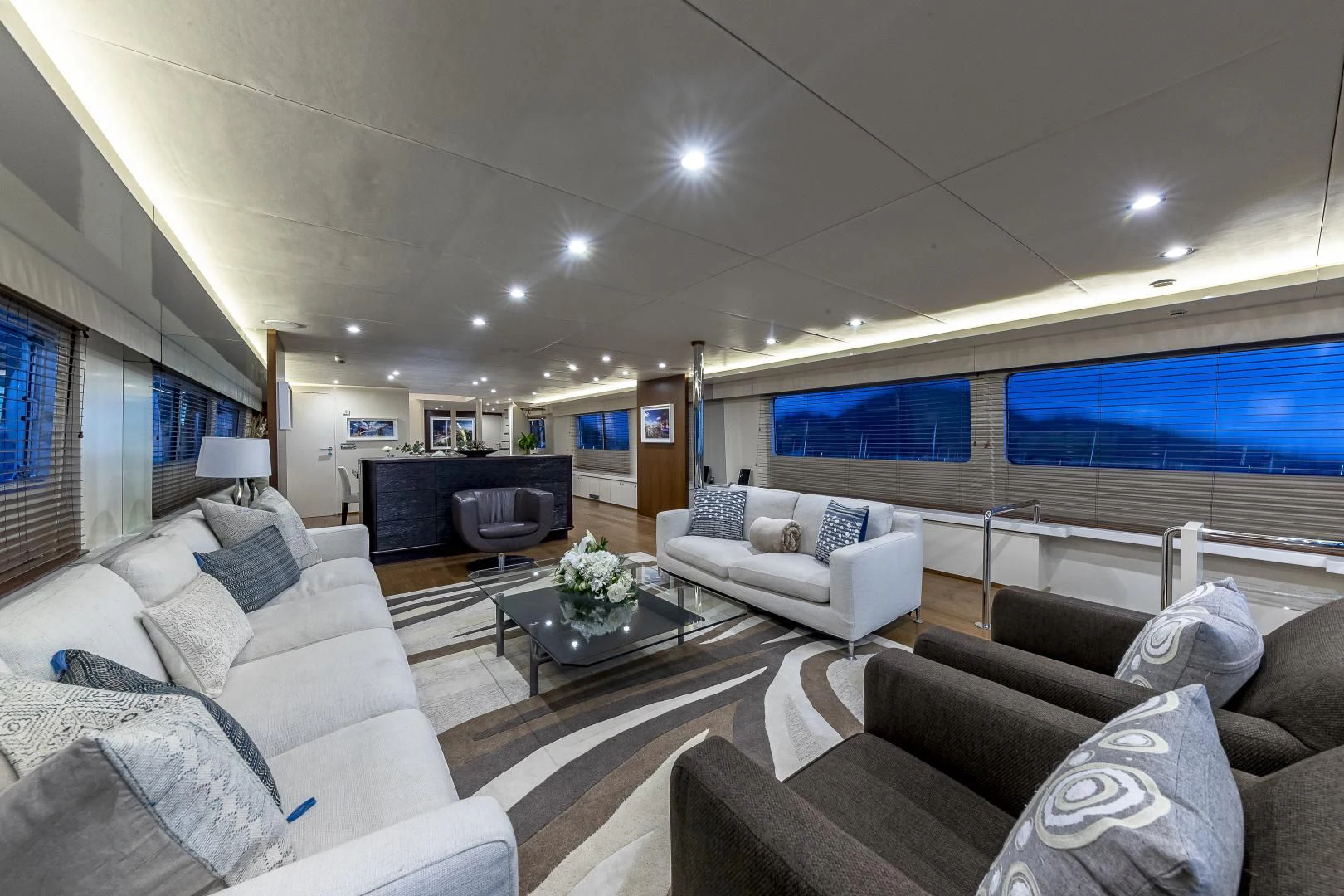 a living room with a large window aboard KARTAL YUVASI Yacht for Charter
