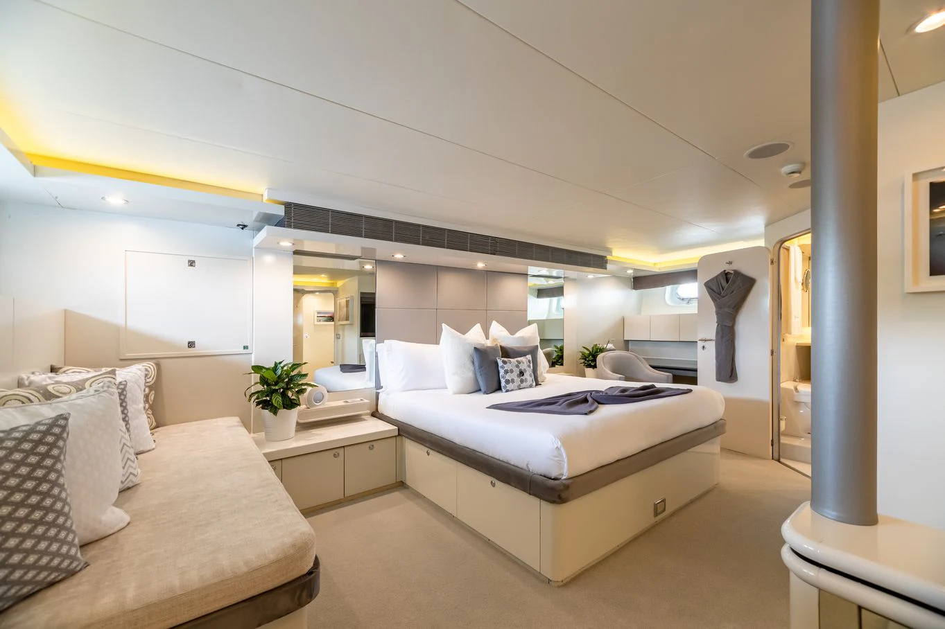 a room with a bed and a couch aboard KARTAL YUVASI Yacht for Charter