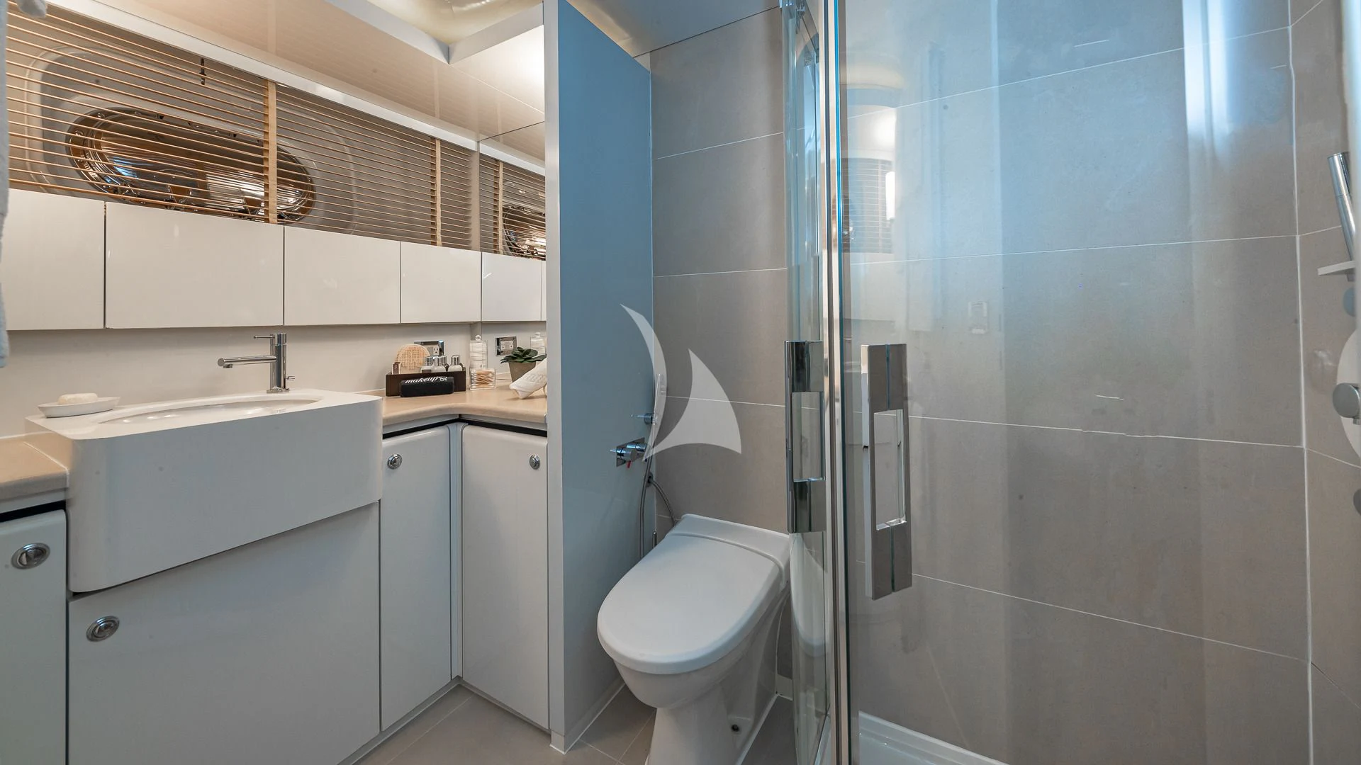 a bathroom with a glass shower aboard KARTAL YUVASI Yacht for Charter