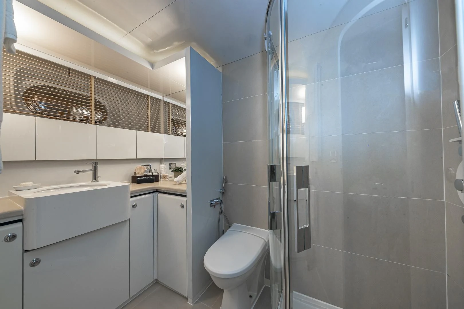 a bathroom with a glass shower aboard KARTAL YUVASI Yacht for Charter