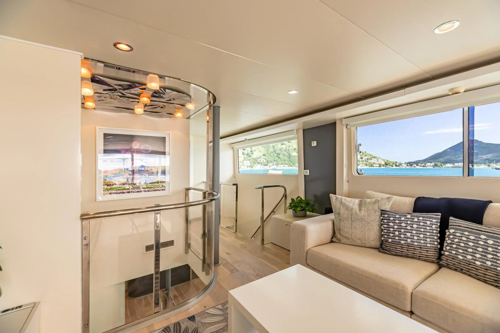 a living room with a large window aboard KARTAL YUVASI Yacht for Charter