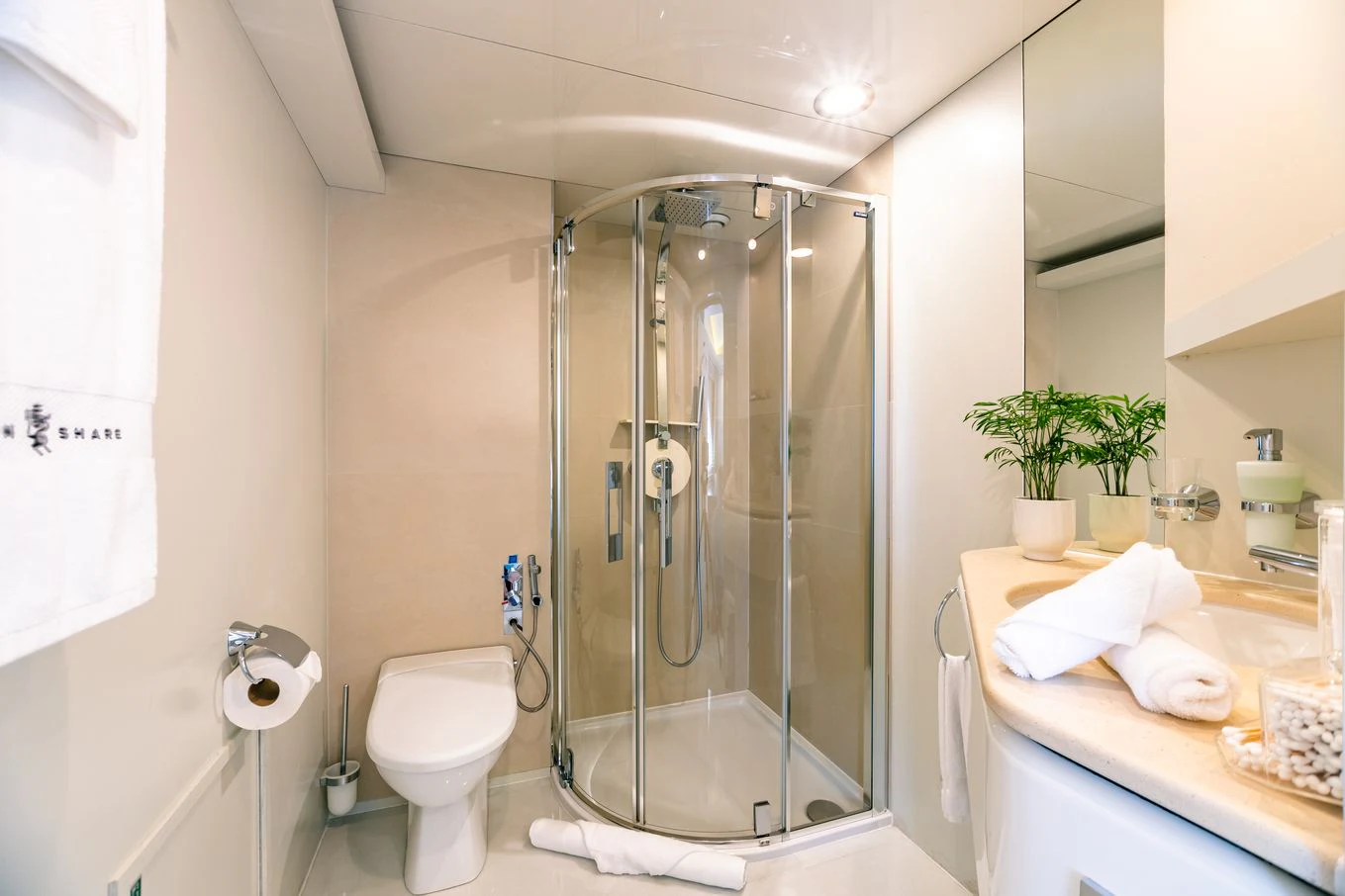 a bathroom with a glass shower aboard KARTAL YUVASI Yacht for Charter