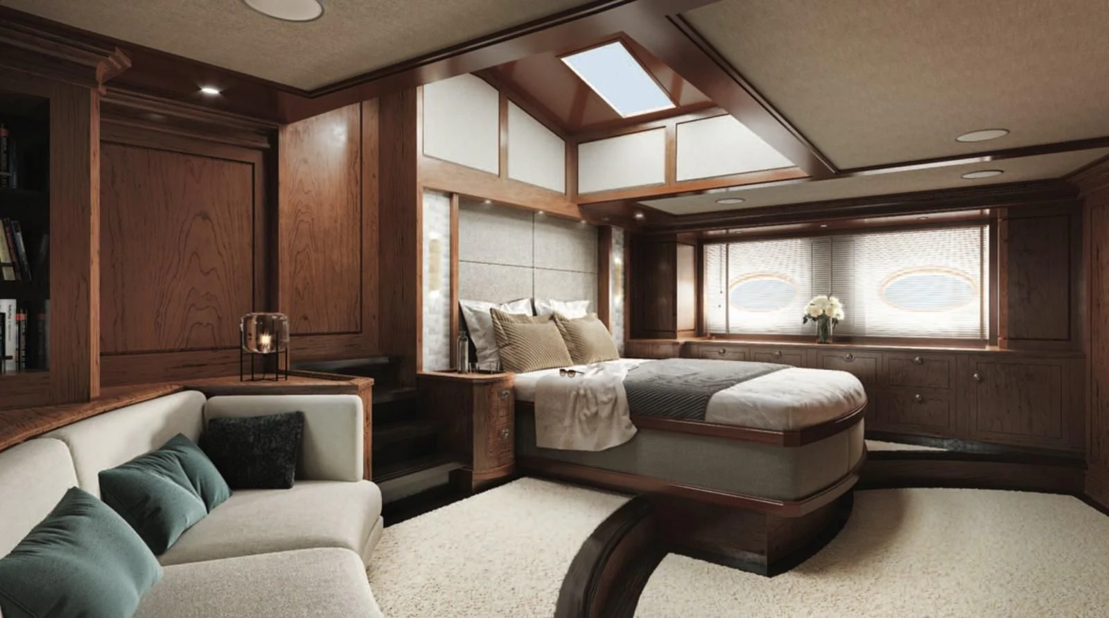 a room with a bed and a couch aboard RAINBOW II Yacht for Sale
