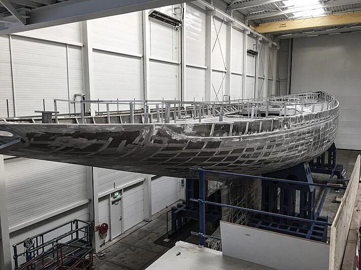 a large factory with many pipes aboard RAINBOW II Yacht for Sale