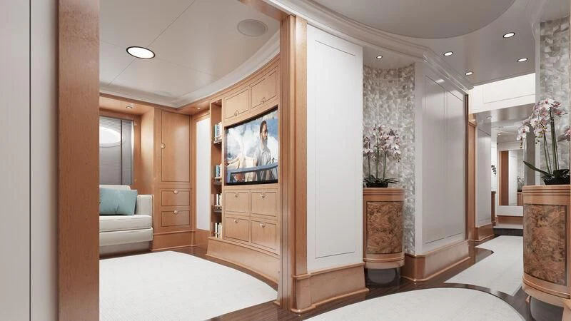a room with a tv and a couch aboard RAINBOW II Yacht for Sale