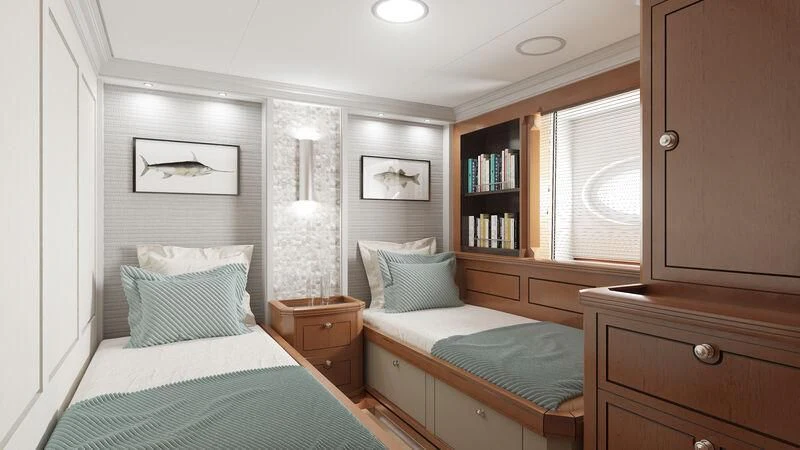a couple of beds in a room aboard RAINBOW II Yacht for Sale