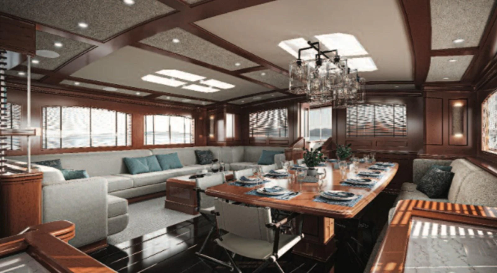 a large living room with a large table and chairs aboard RAINBOW II Yacht for Sale