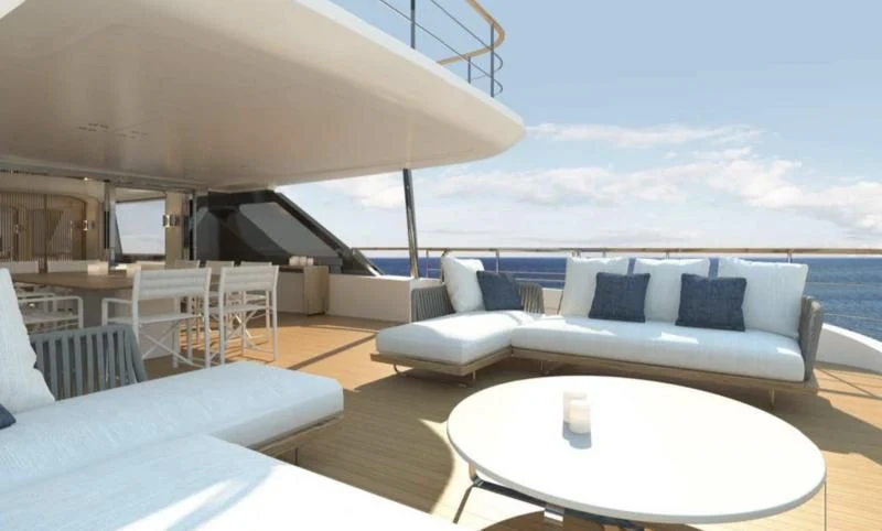 a room with a couch and a table and chairs aboard DAWO Yacht for Sale