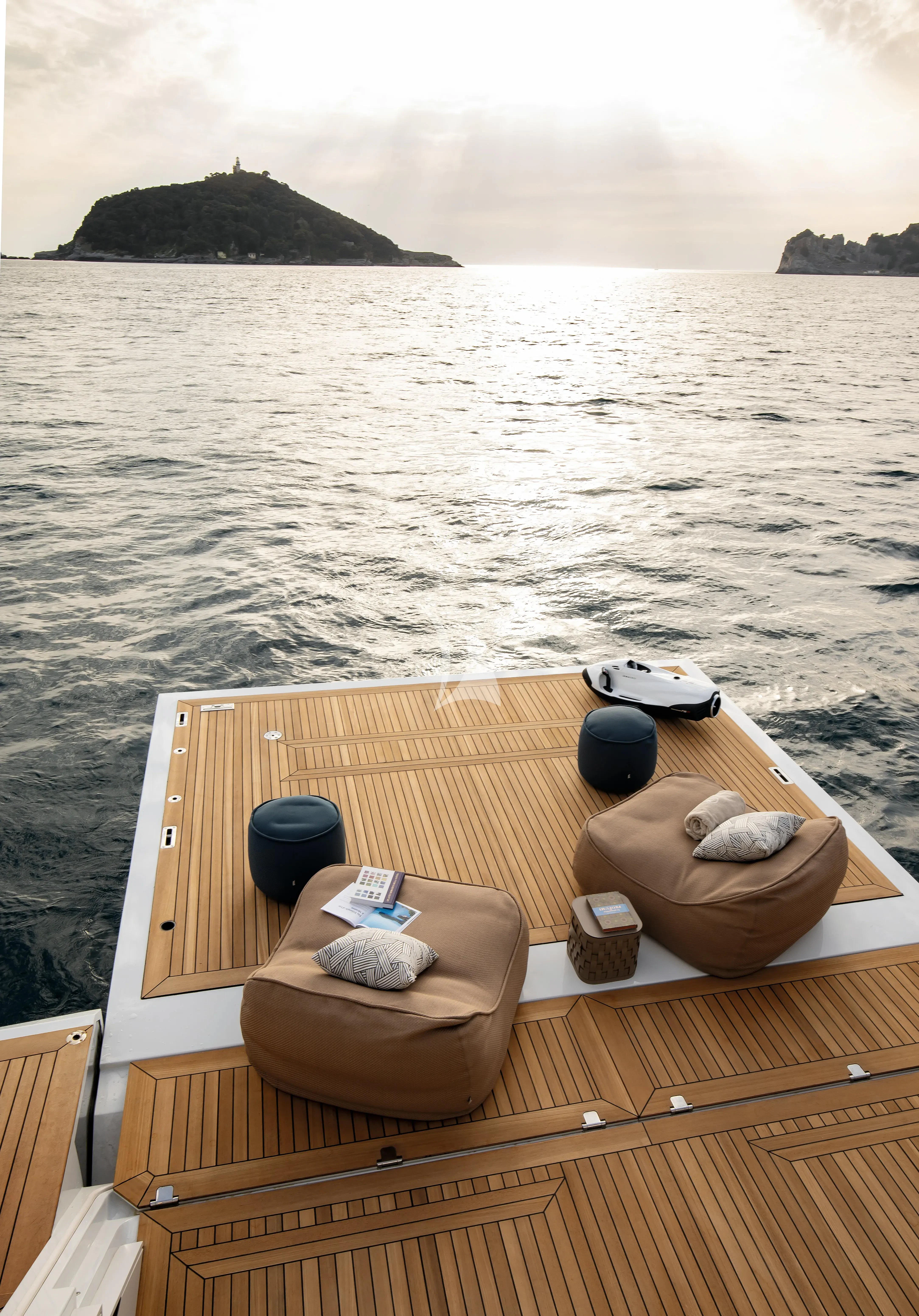 a boat with a table and chairs on it aboard DAWO Yacht for Sale