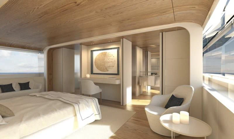 a room with a bed and a chair aboard DAWO Yacht for Sale