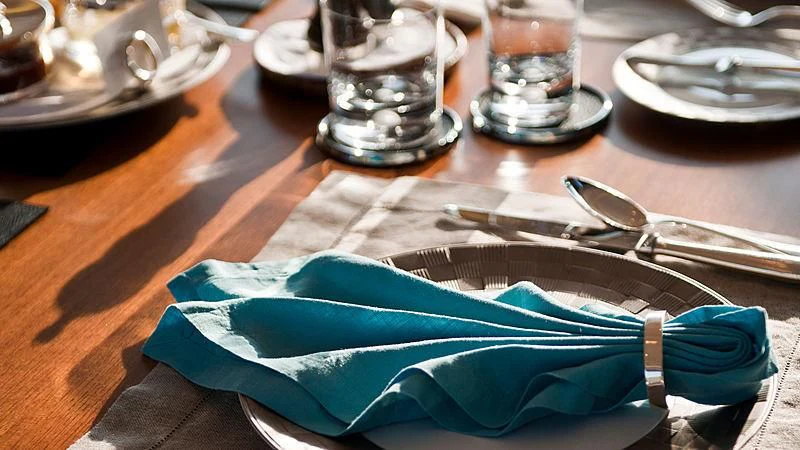 a blue towel on a table aboard MELEK Yacht for Sale