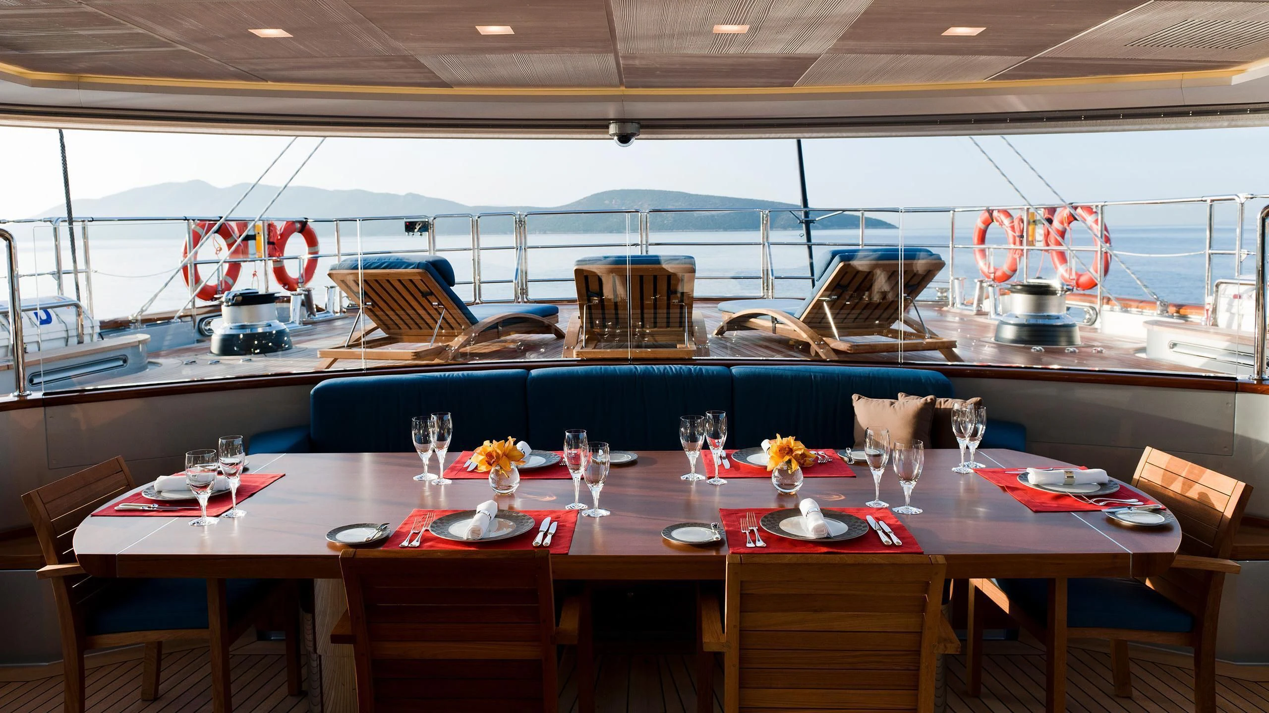 a restaurant with a table and chairs aboard MELEK Yacht for Sale