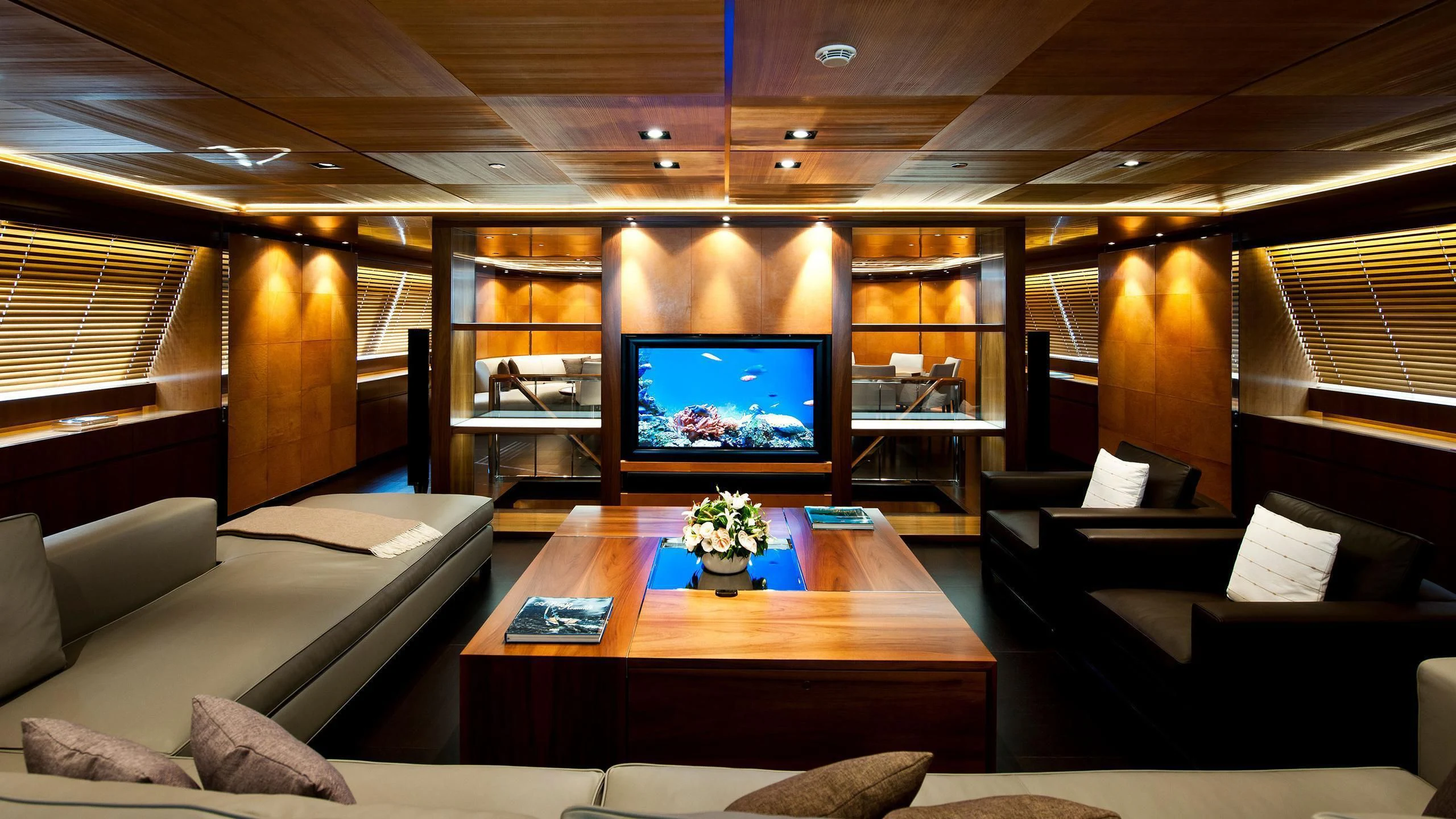 a room with a tv and couches aboard MELEK Yacht for Sale
