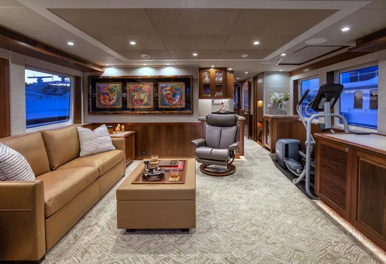 a living room with a large mirror aboard NEW JOURNEY Yacht for Sale