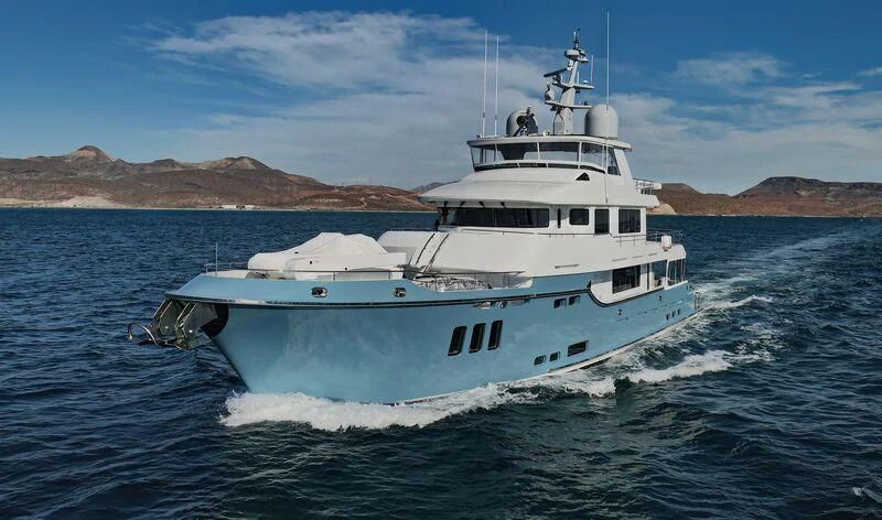 a white boat on the water aboard NEW JOURNEY Yacht for Sale