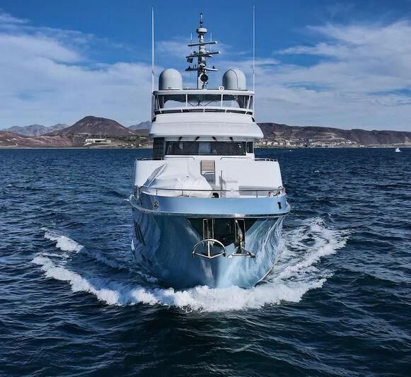 a large white boat on the water aboard NEW JOURNEY Yacht for Sale
