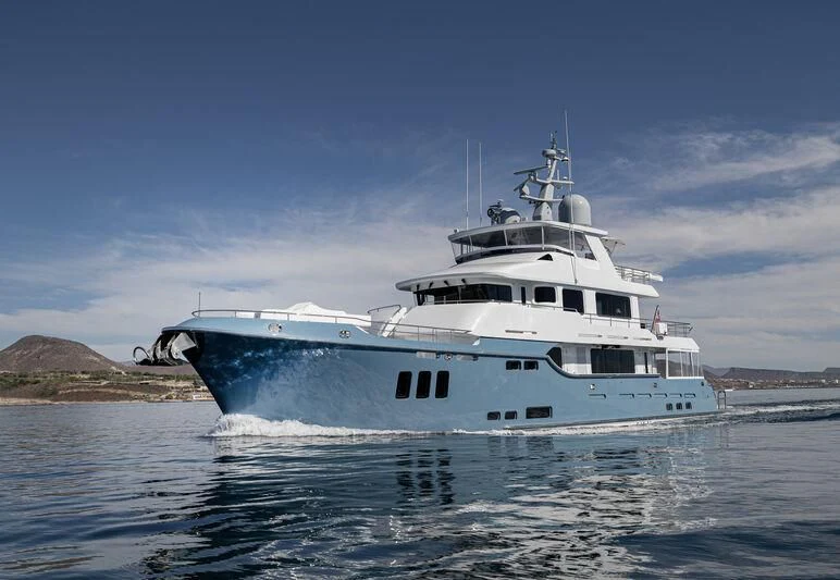 a large white boat in the water aboard NEW JOURNEY Yacht for Sale