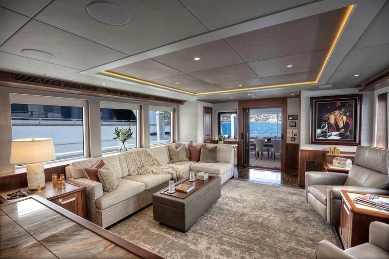 a living room with a large window aboard NEW JOURNEY Yacht for Sale
