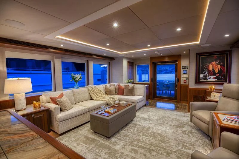 a living room with a large window aboard NEW JOURNEY Yacht for Sale
