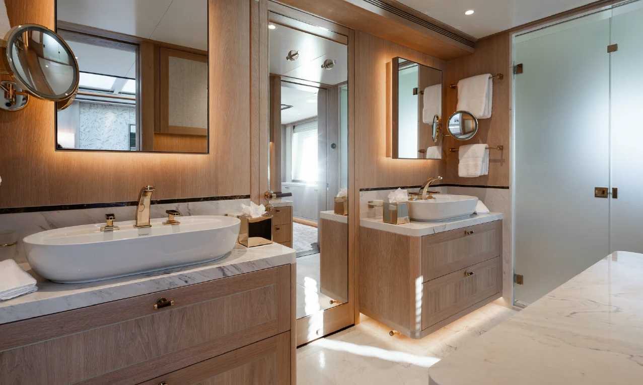 a bathroom with a sink and a mirror aboard SEAFLOWER Yacht for Sale
