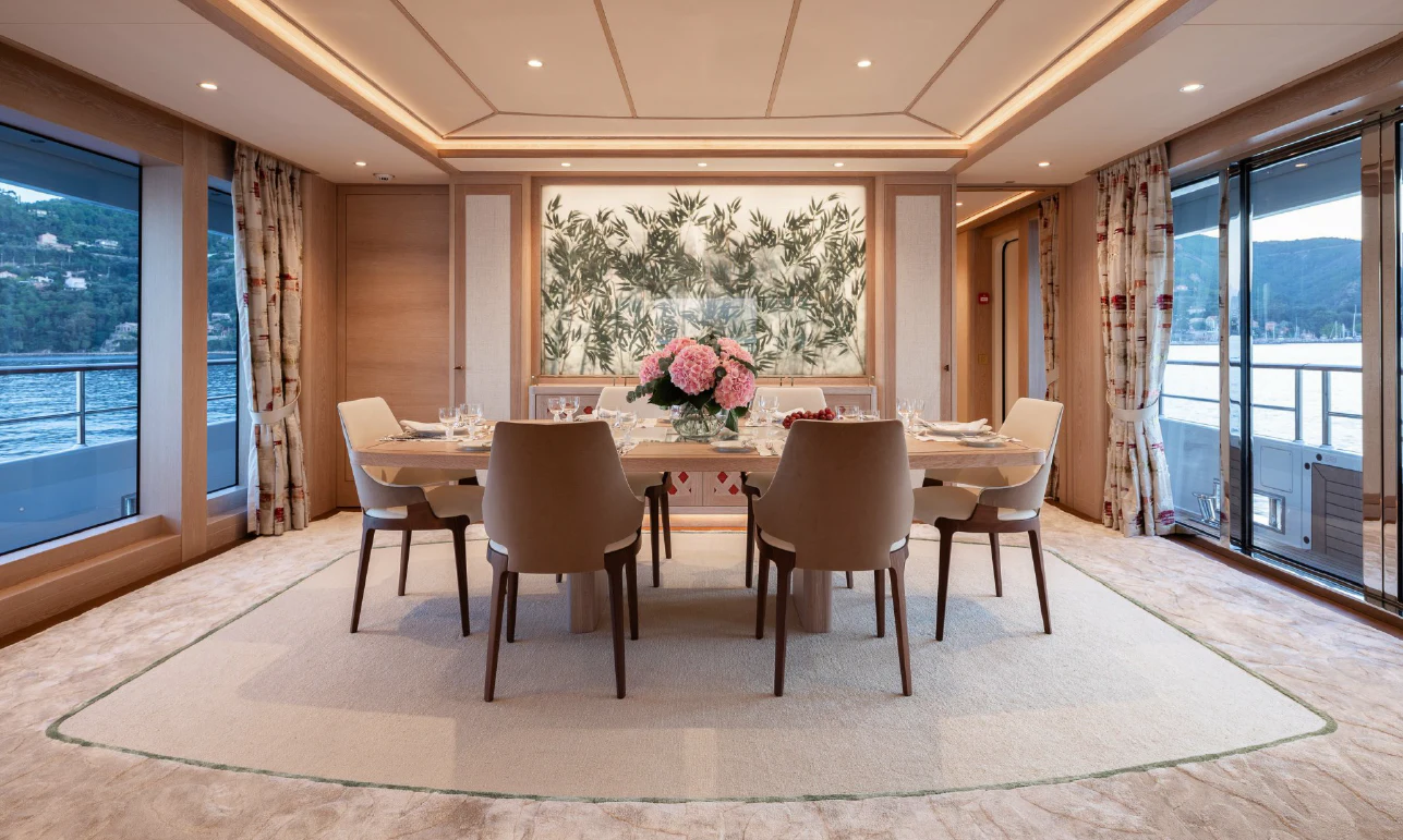 a large conference room with a table and chairs aboard SEAFLOWER Yacht for Sale