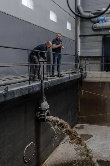 men working on a building aboard SEAFLOWER Yacht for Sale