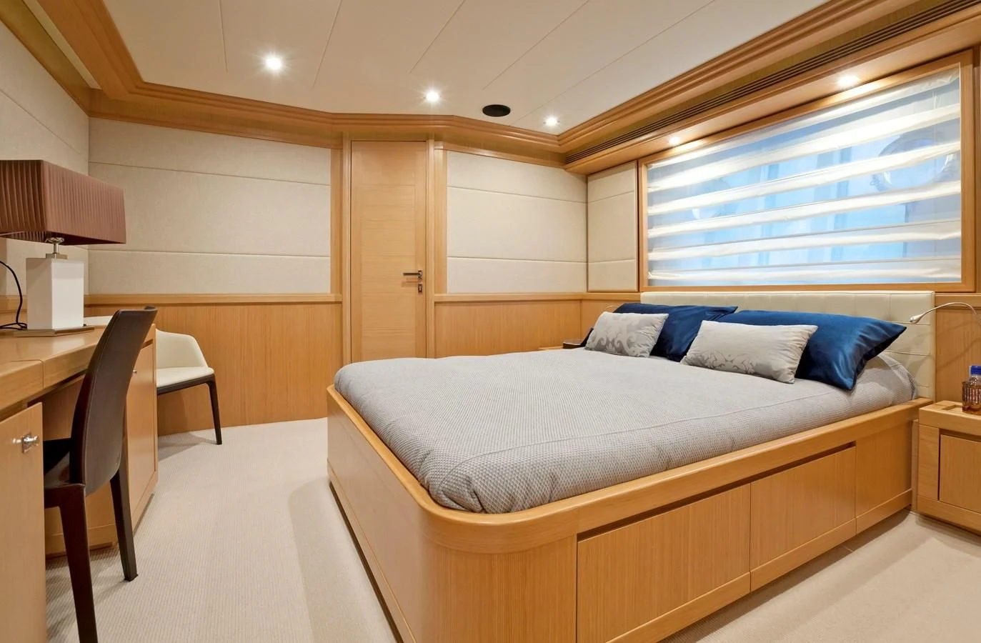 a large bed in a room aboard LA PAUSA Yacht for Sale