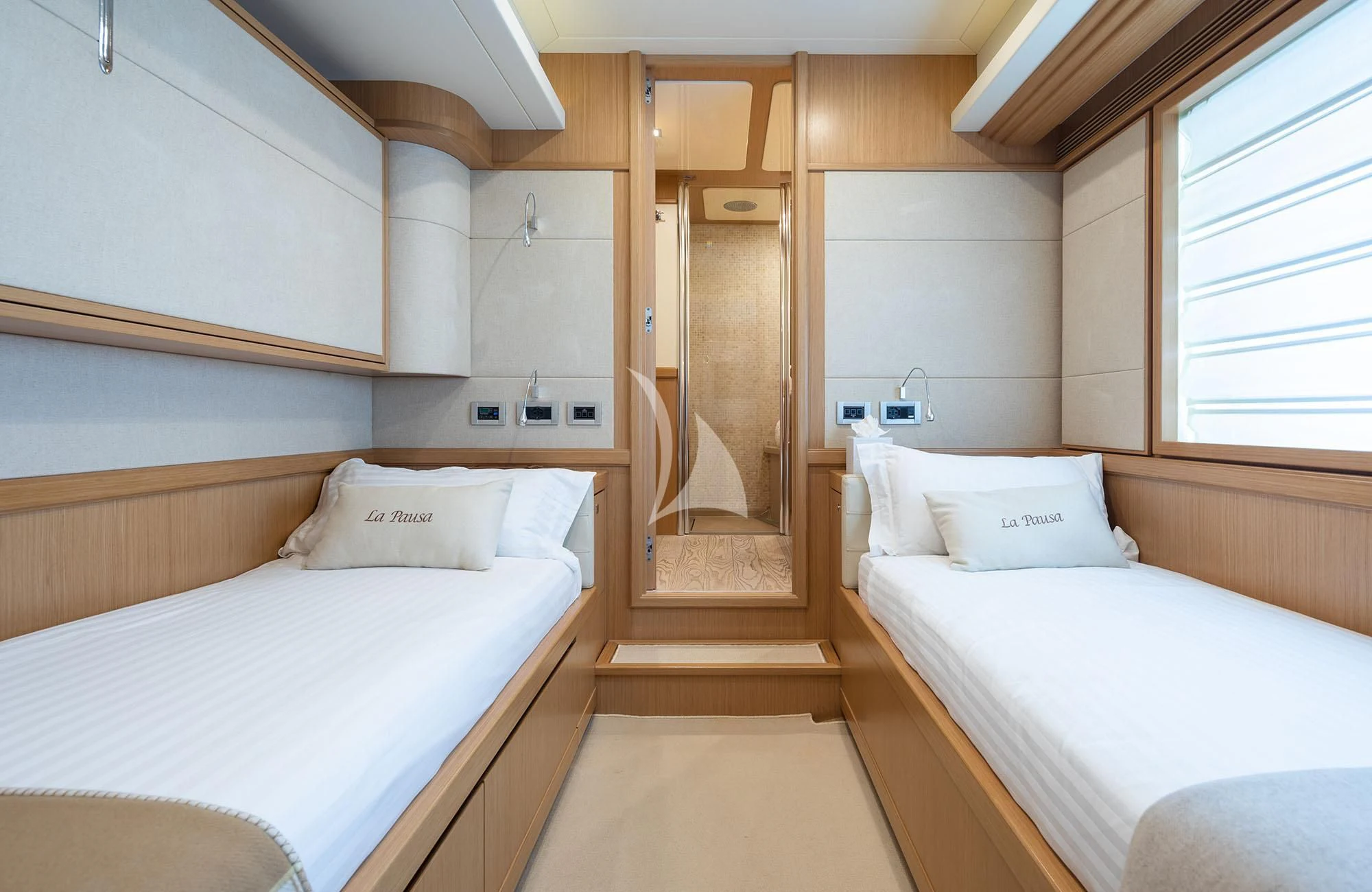 a room with two beds aboard LA PAUSA Yacht for Sale