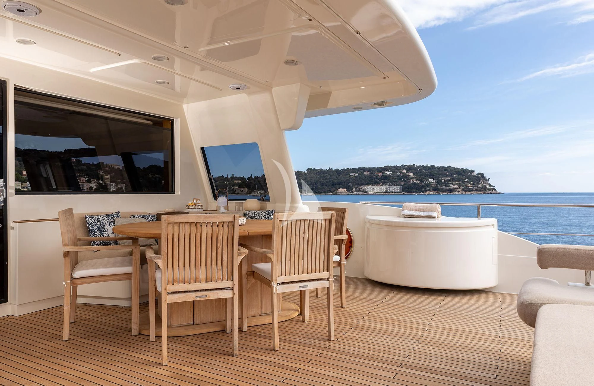 a room with a table and chairs aboard LA PAUSA Yacht for Sale