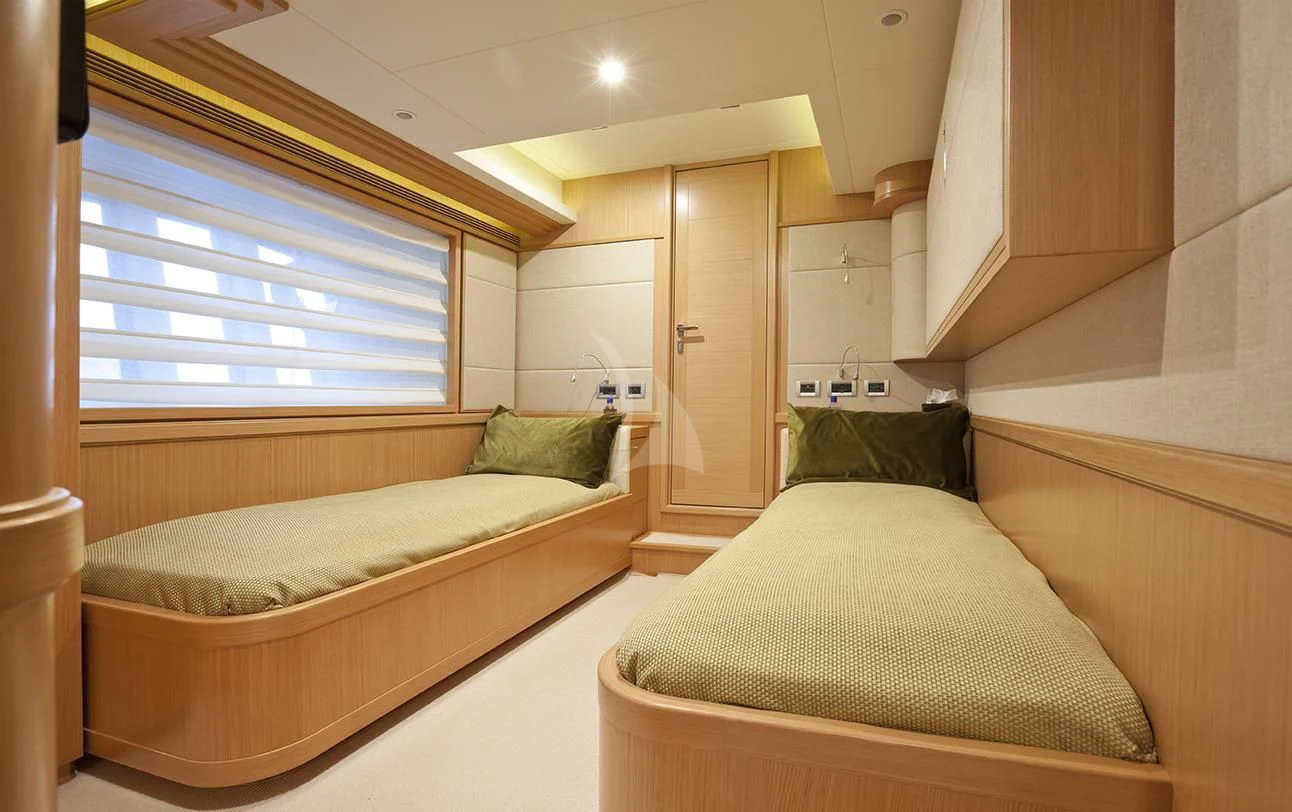 a room with two beds aboard LA PAUSA Yacht for Sale
