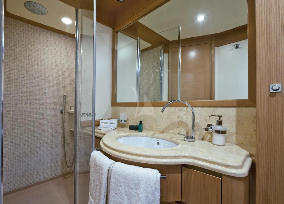 a bathroom with a large mirror aboard LA PAUSA Yacht for Sale