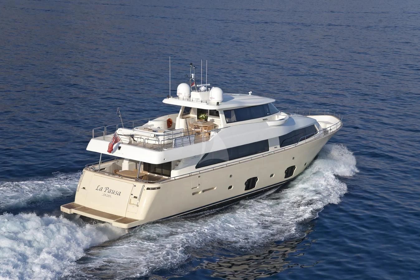 a white boat on the water aboard LA PAUSA Yacht for Sale