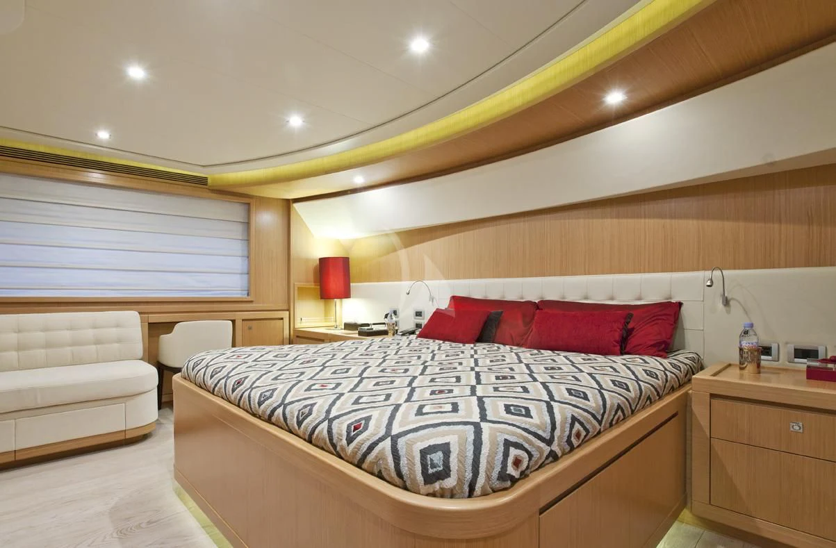 a bed in a room aboard LA PAUSA Yacht for Sale