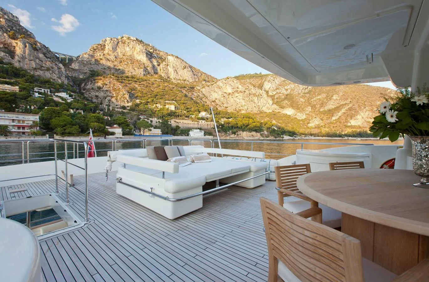 a large white boat on a deck aboard LA PAUSA Yacht for Sale