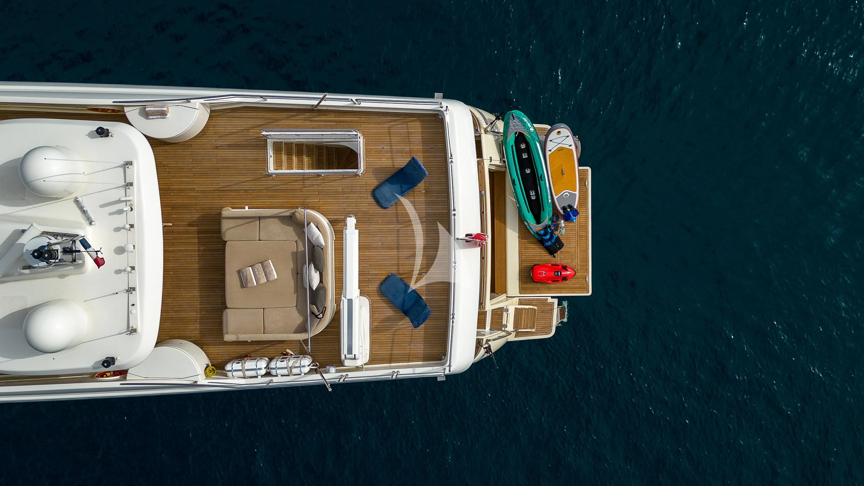 a white boat on a black surface aboard LA PAUSA Yacht for Sale