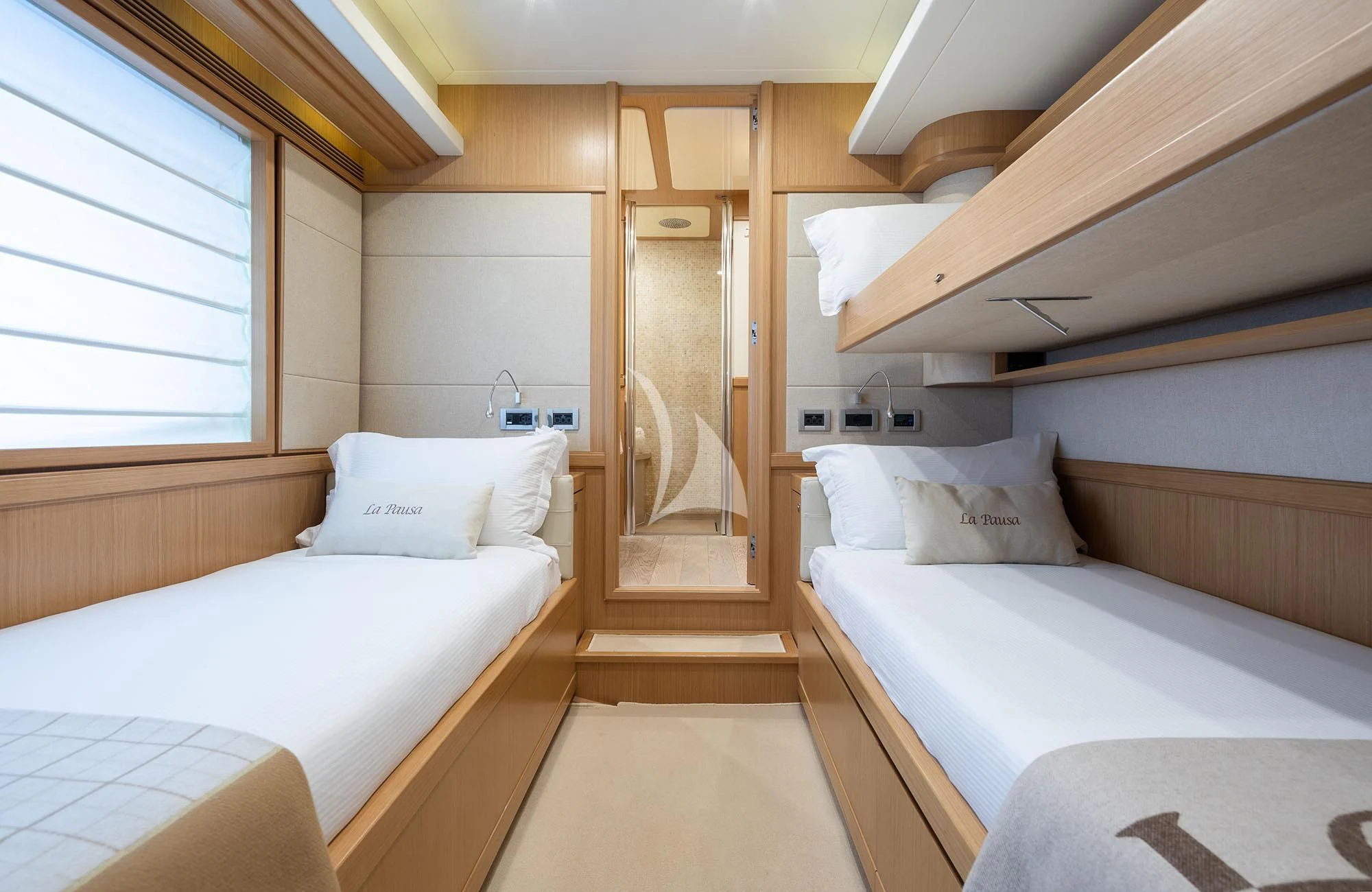 a room with two beds aboard LA PAUSA Yacht for Sale