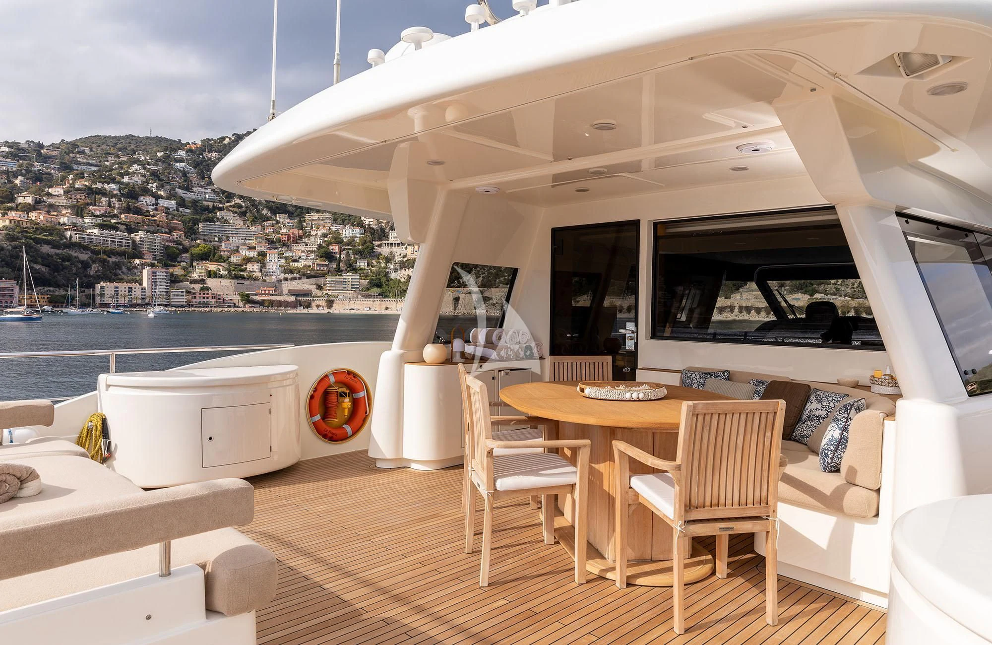 a room with a table and chairs aboard LA PAUSA Yacht for Sale