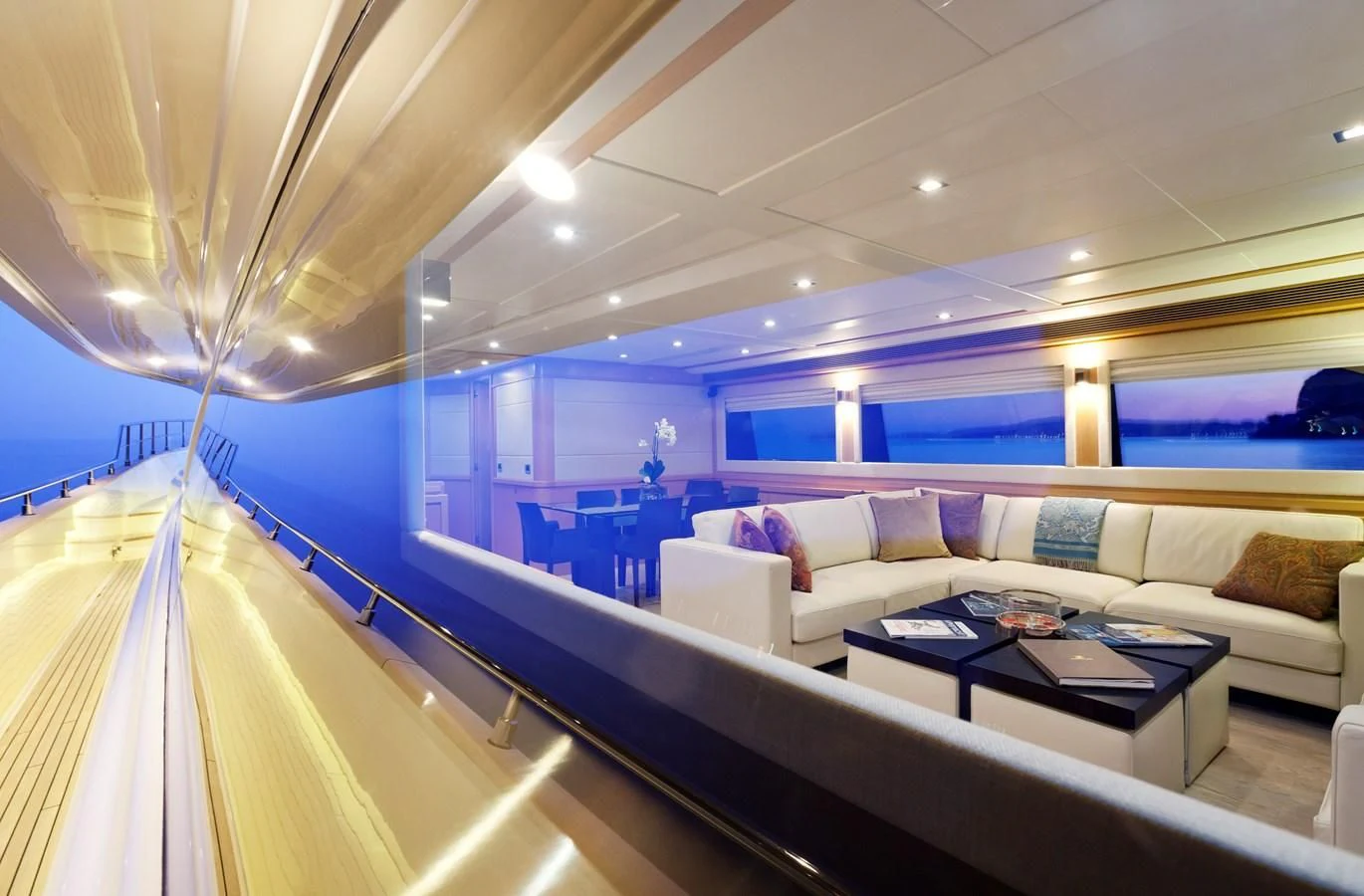 a room with a couch and a table aboard LA PAUSA Yacht for Sale
