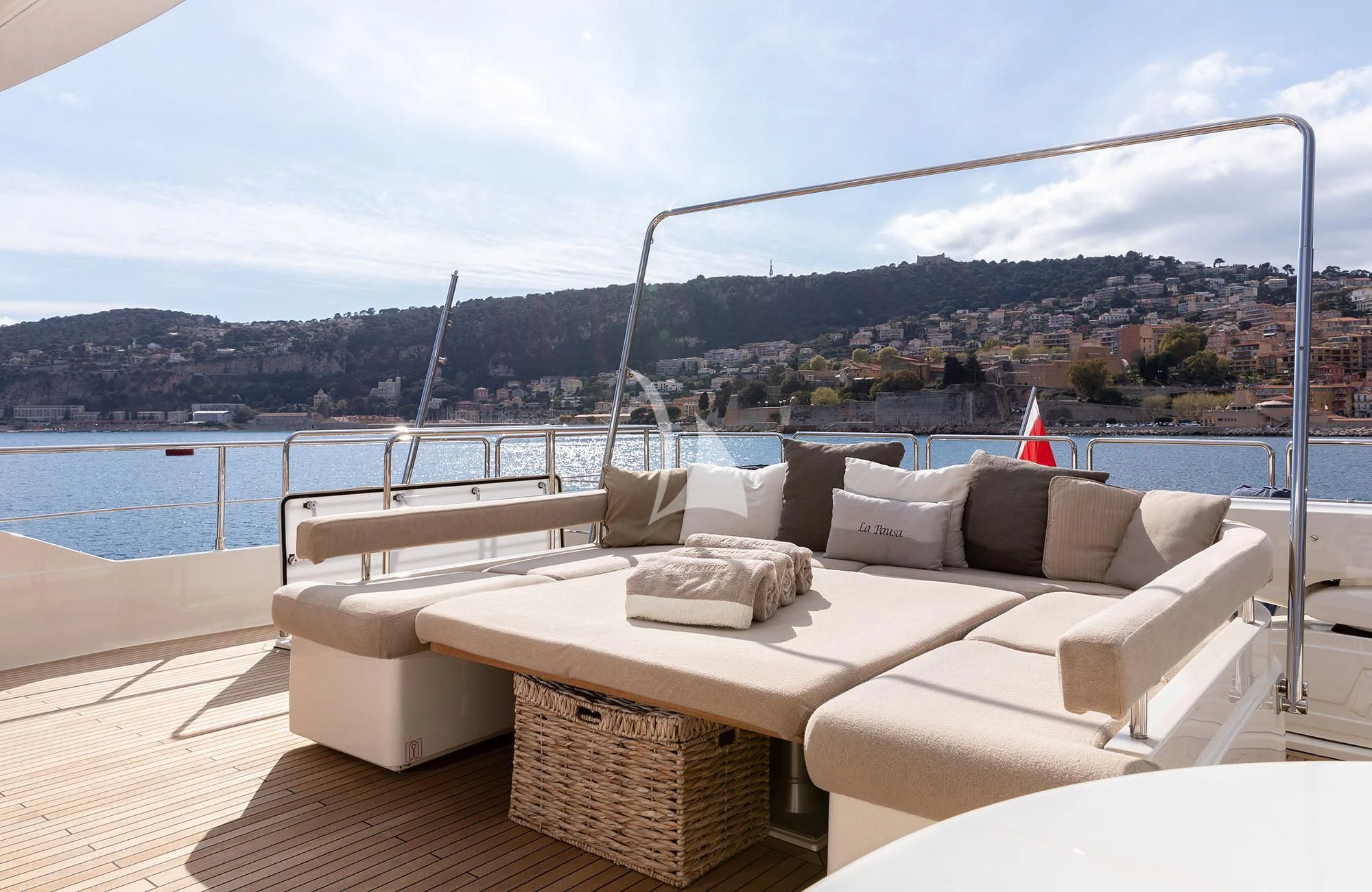 a room with a couch and a view of a city aboard LA PAUSA Yacht for Sale