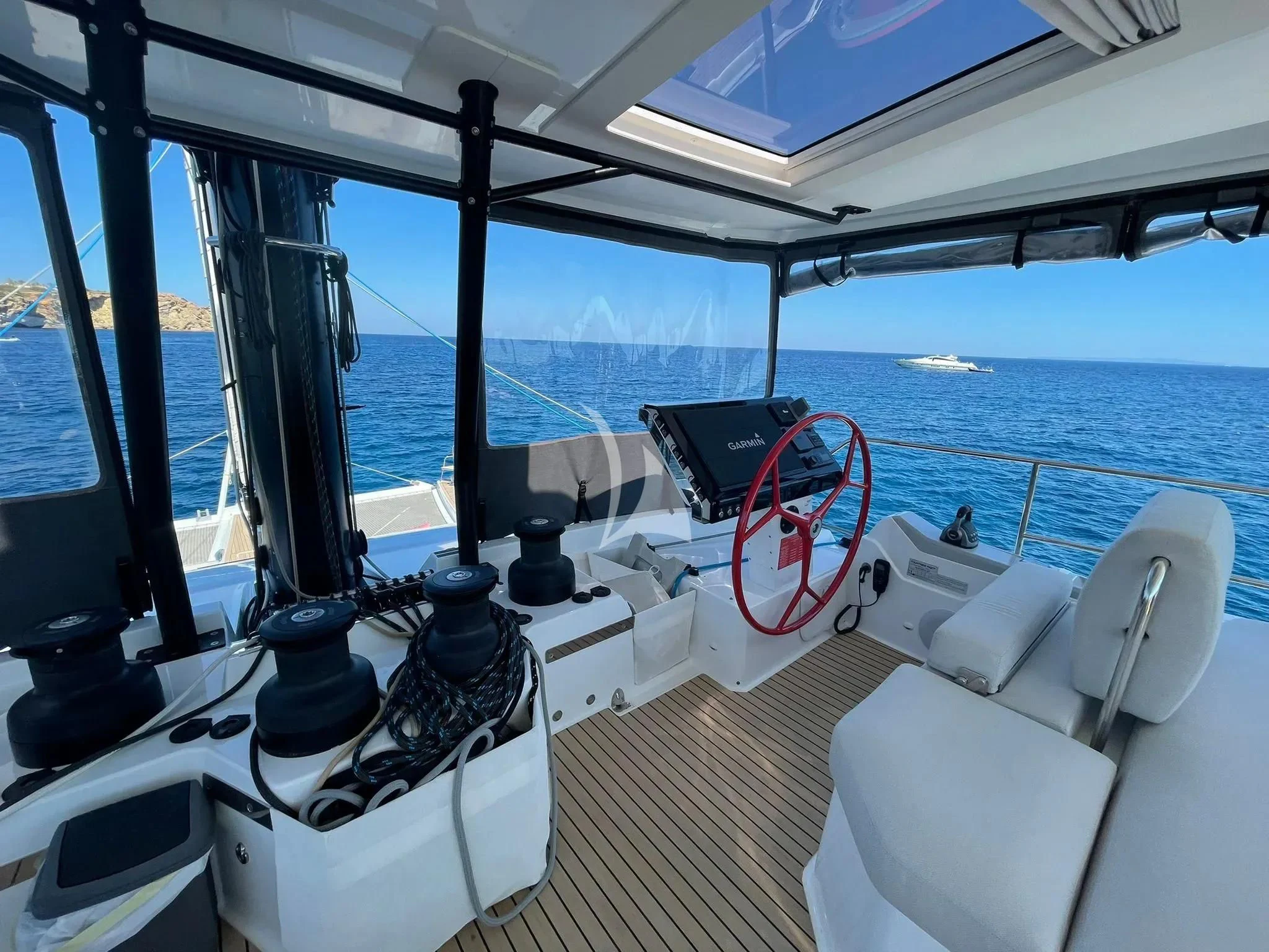 a boat with a large screen aboard CHILOE Yacht for Charter