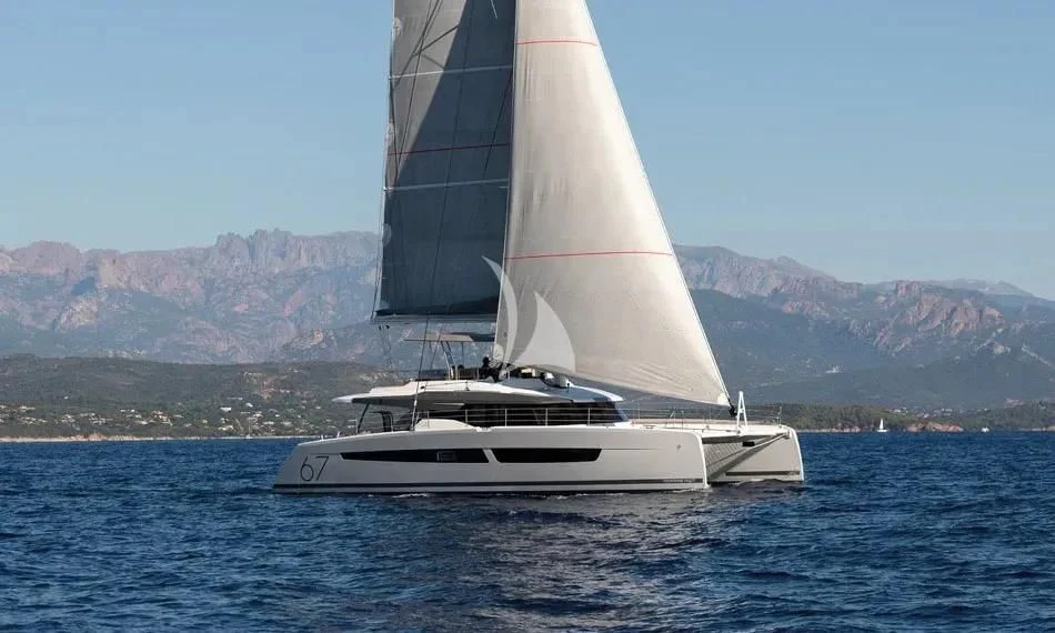 a white sailboat on the water aboard CHILOE Yacht for Charter