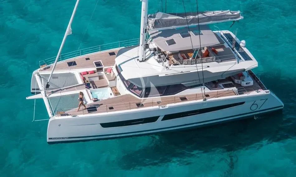 a white boat in the water aboard CHILOE Yacht for Charter