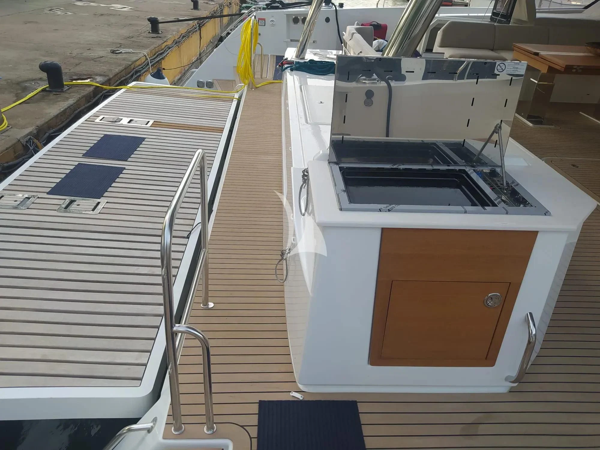 a boat with a deck aboard CHILOE Yacht for Charter