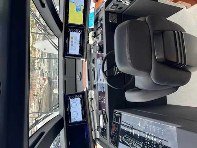 a computer with a screen and a monitor aboard G Yacht for Sale