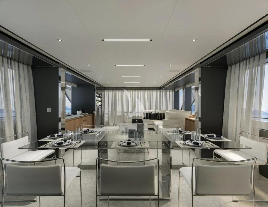 a room with a large desk and chairs aboard G Yacht for Sale