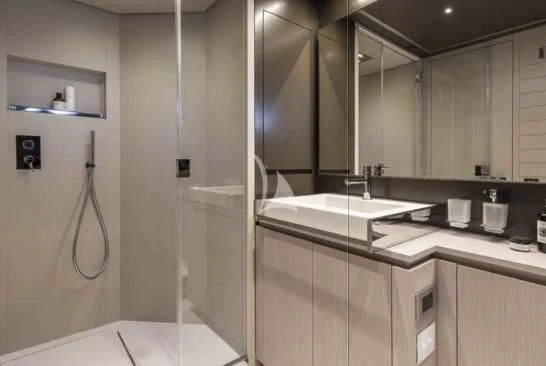 a bathroom with a sink and a mirror aboard G Yacht for Sale