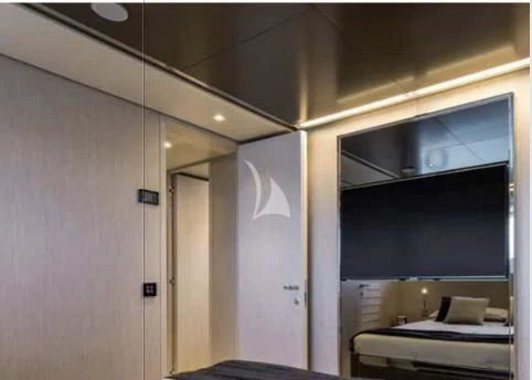 a room with a desk and a computer aboard G Yacht for Sale