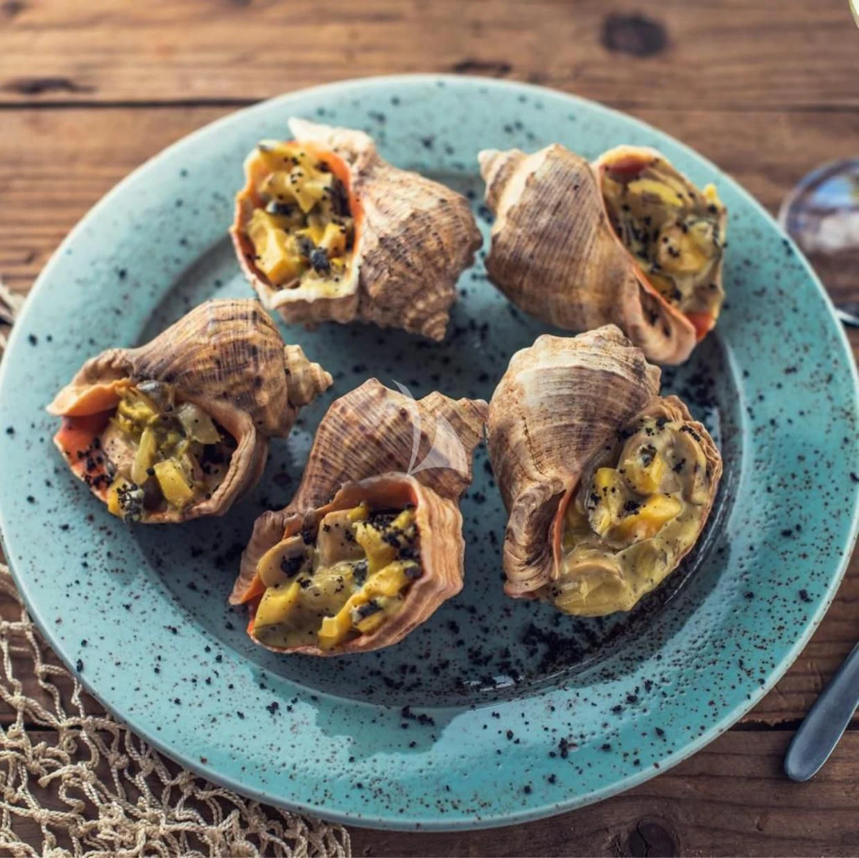 a plate of food aboard G Yacht for Sale